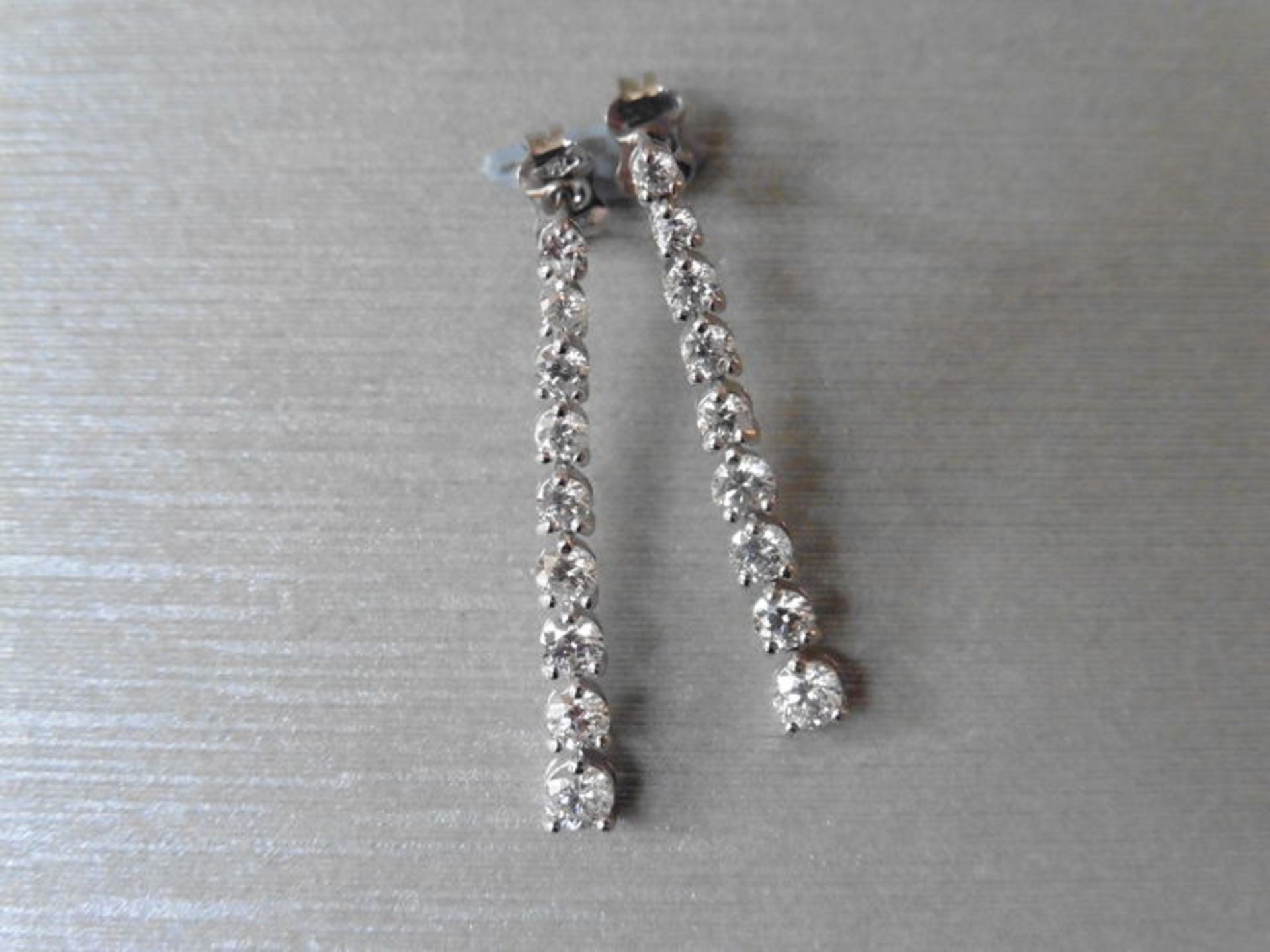 1.50ct graduated diamond drop earrings. Graduated brilliant cut diamonds, I colour, si2 clarity