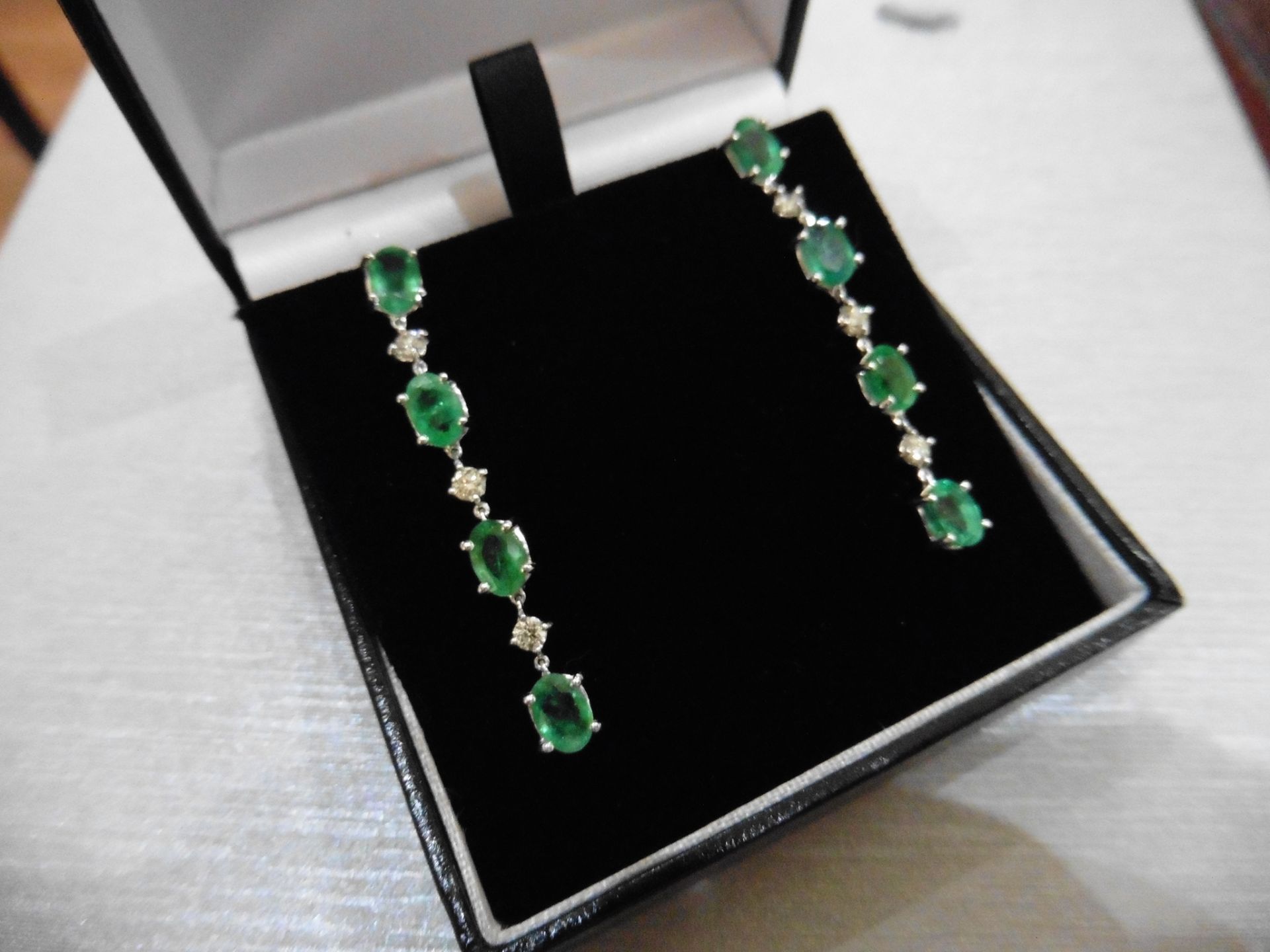 3ct emerald and diamond drop earrings. Each set with 4 oval cut emeralds and 3 brilliant cut - Image 4 of 5