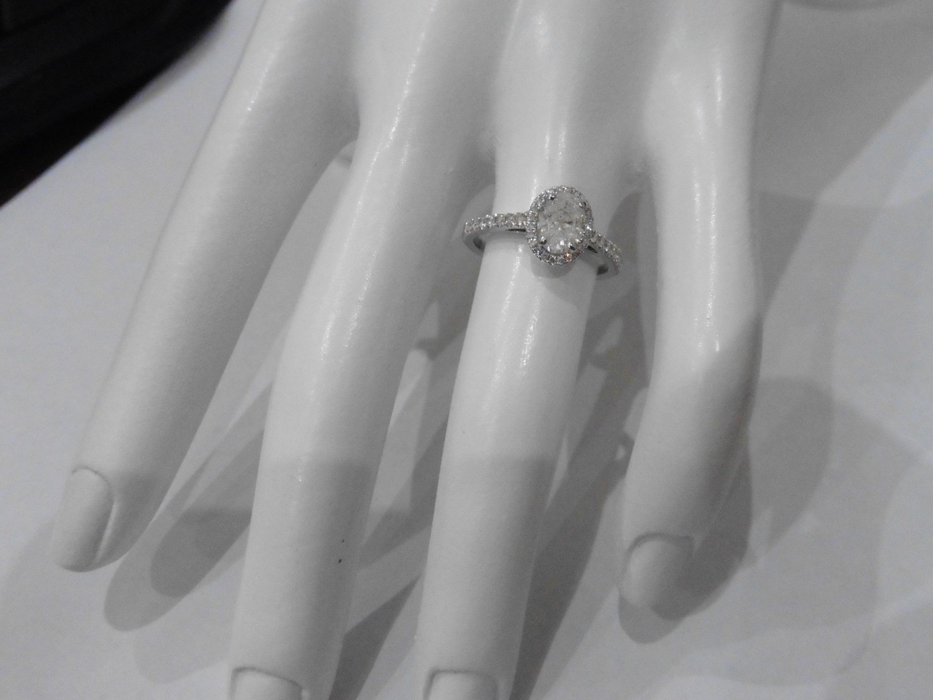 0.84ct oval diamond set solitaire ring. Centre diamond G/H colour, Si3 clarity. Halo setting of - Image 5 of 5