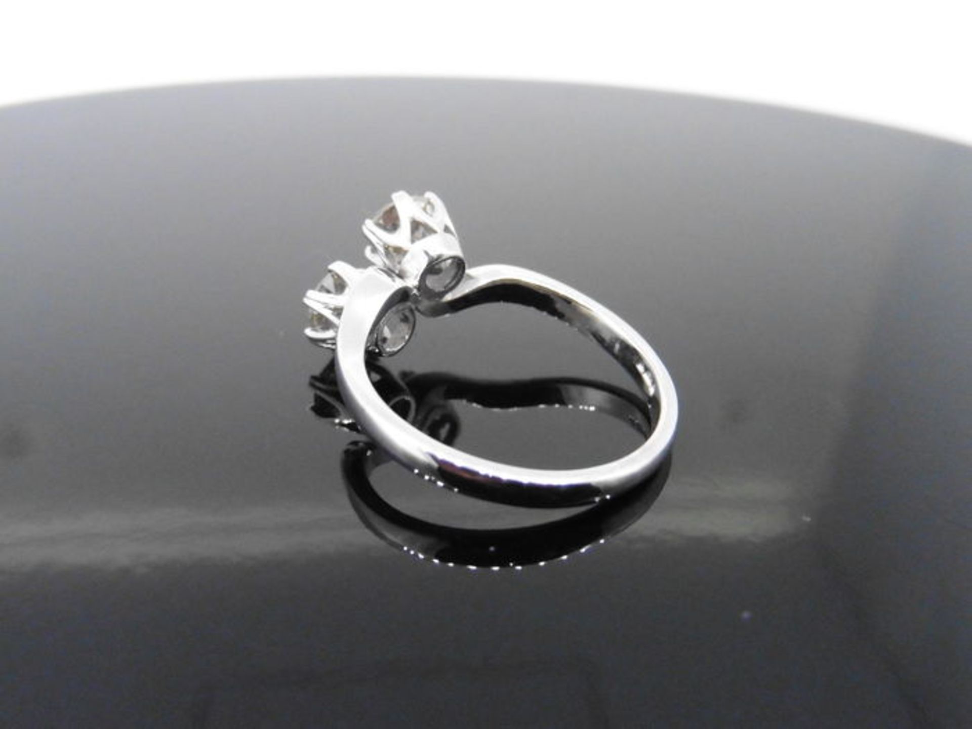 2ct diamond twist ring set with 2 brilliant cut diamonds, J colour, P1 clarity. Set in a claw - Image 2 of 4