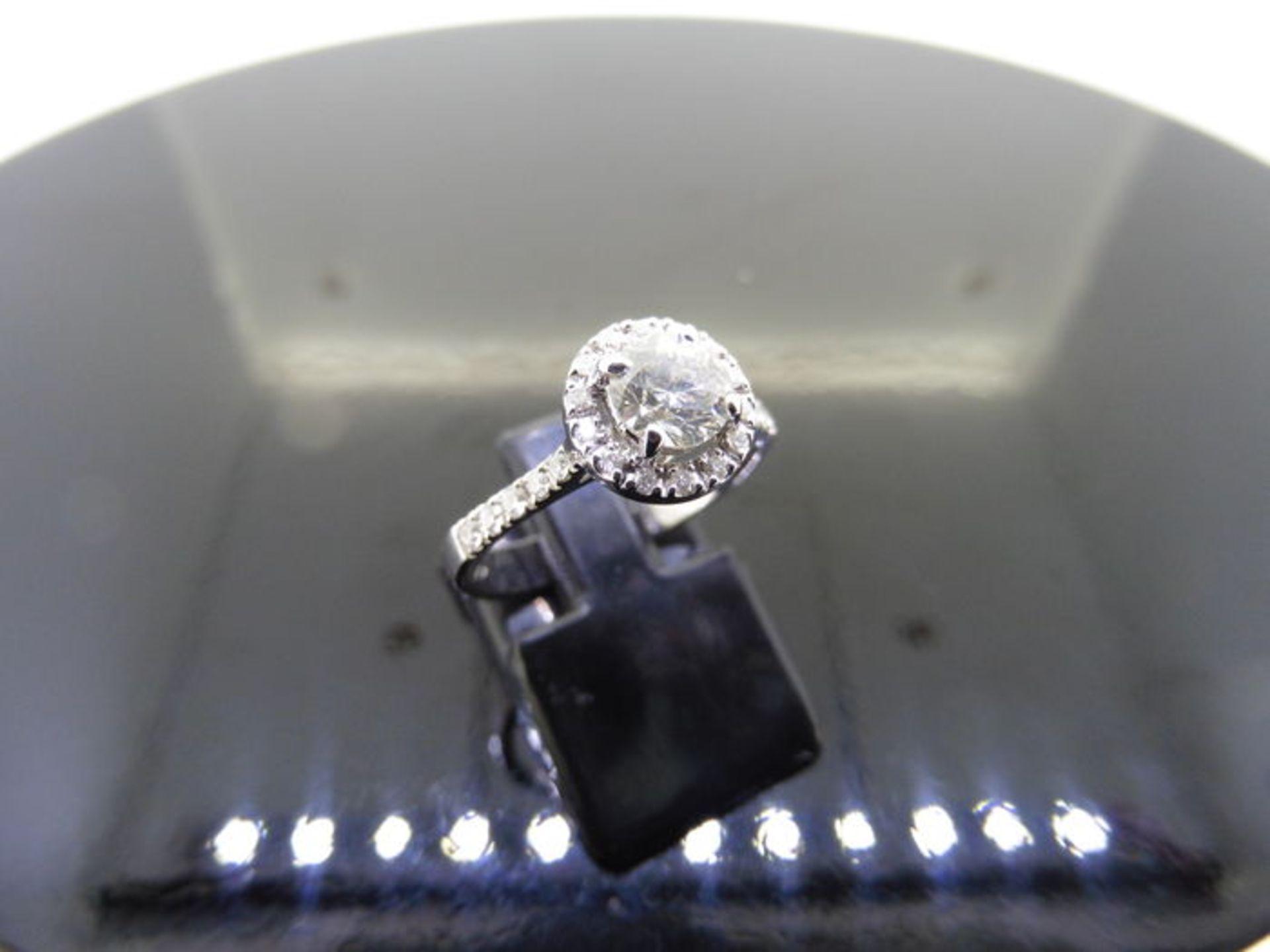 1.00ct diamond set solitaire ring. Set with a 1ct enhanced brilliant cut diamond, J colour, P1.