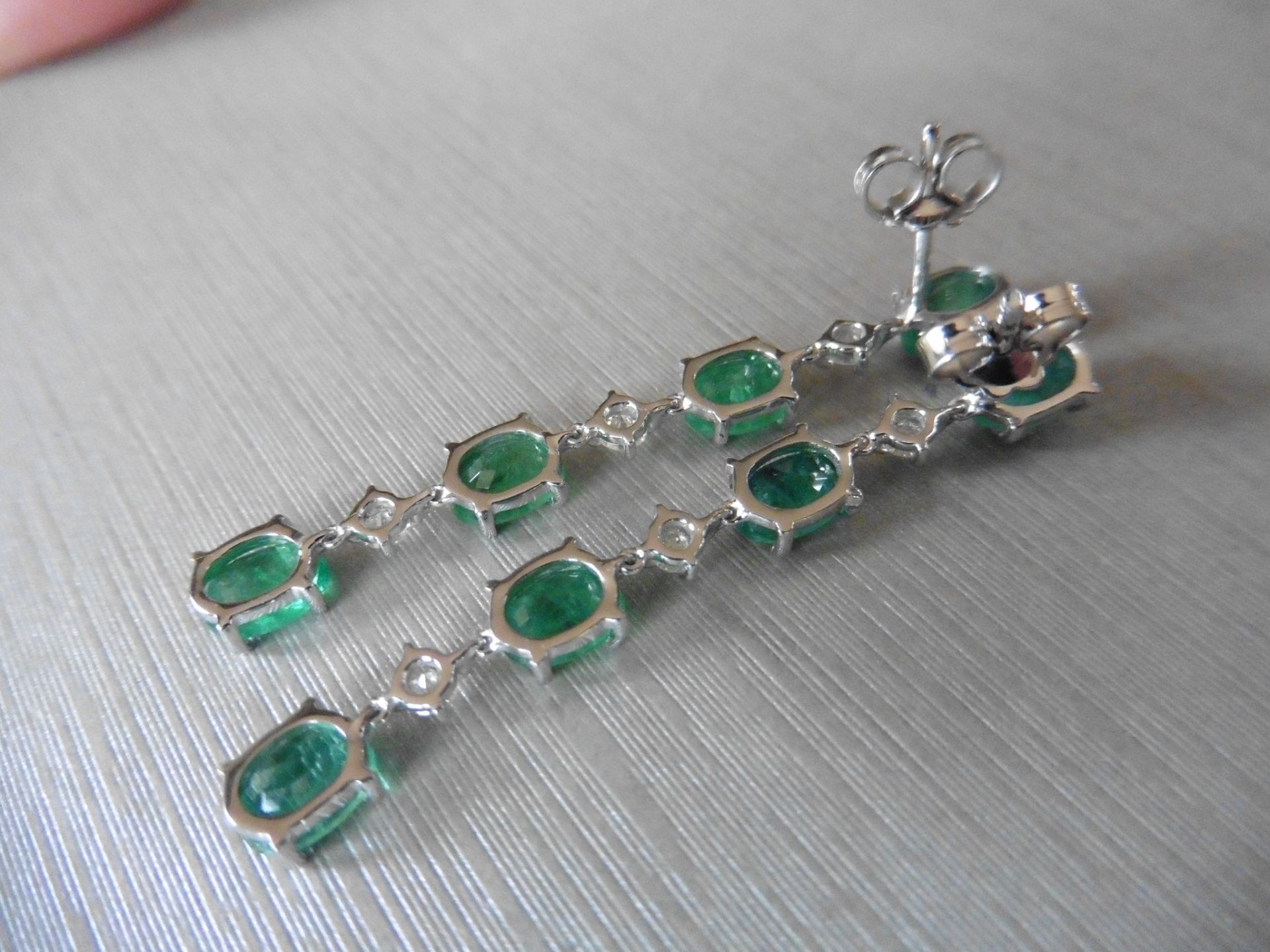 3ct emerald and diamond drop earrings. Each set with 4 oval cut emeralds and 3 brilliant cut - Image 3 of 5