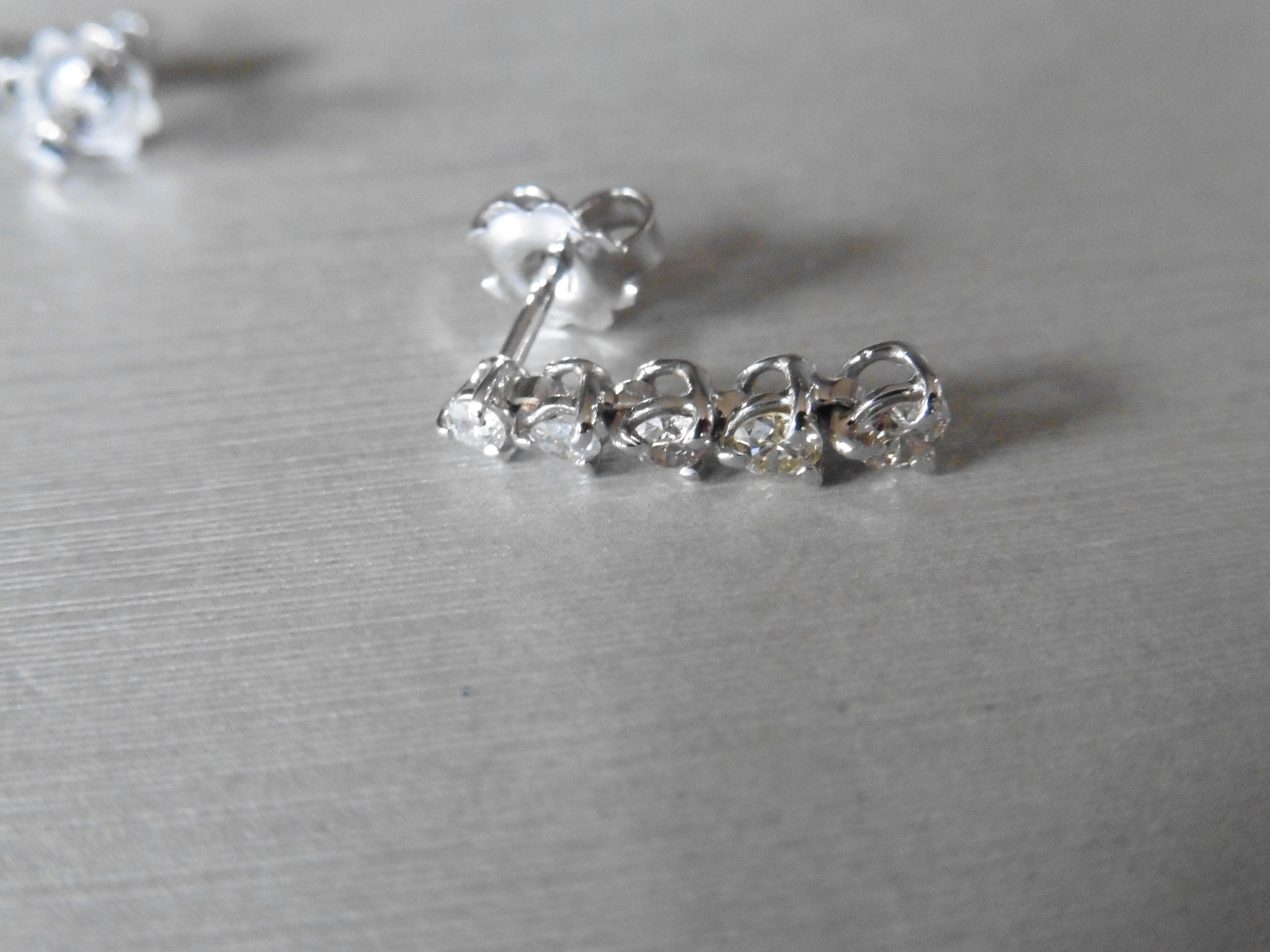 0.70ct diamond drop earrings. Each set with 5 graduated brilliant cut diamonds. I colour, si2 - Image 3 of 3