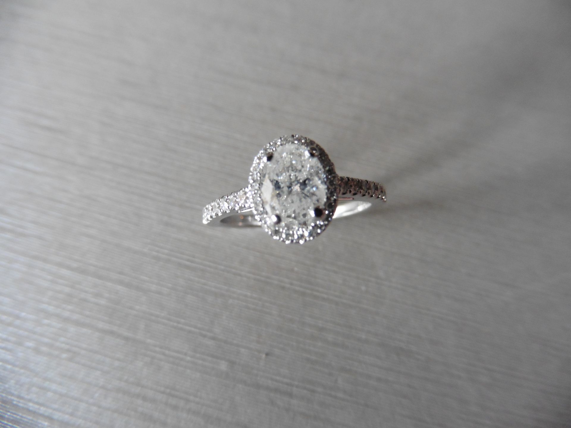 0.84ct oval diamond set solitaire ring. Centre diamond G/H colour, Si3 clarity. Halo setting of - Image 4 of 5