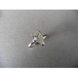 0.93ct pear shaped diamond solitaire ring. 3 claw setting in platinum. I colour, Si3 clarity.
