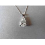 0.70ct diamond solitaire pendant set with a pear shaped diamond, I colour, Si1 clarity. 3 claw