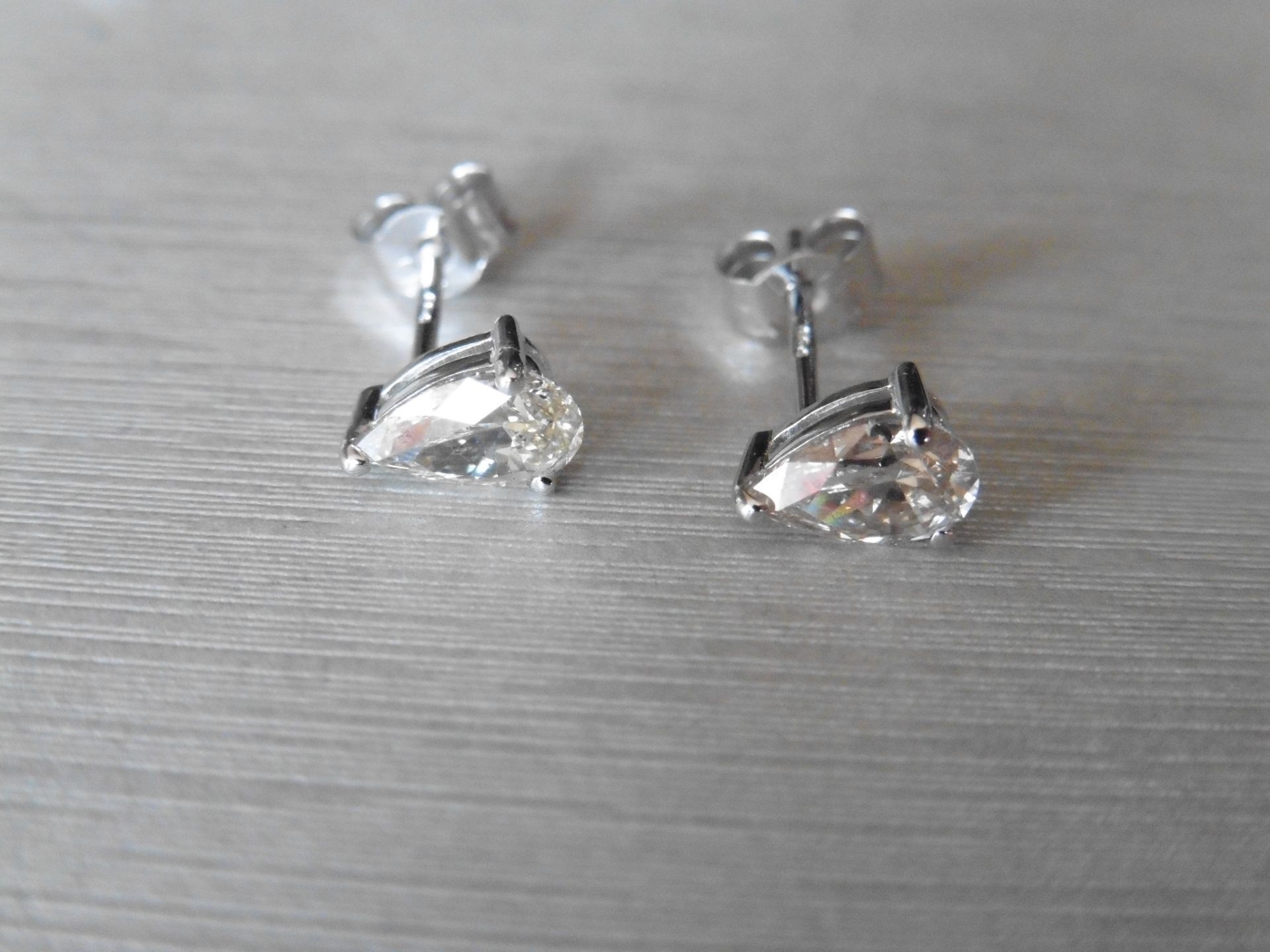 1.40ct Diamond solitaire earrings set with pear shaped diamonds, I colour VS2 clarity. Three claw - Image 3 of 3