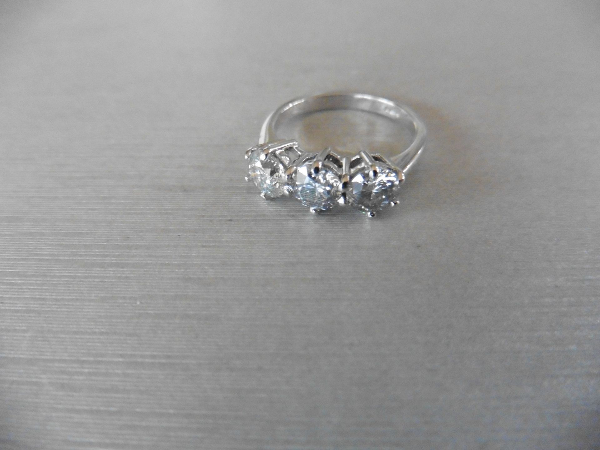 2.10ct trilogy diamond ring. 3 brilliant cut diamonds, I colour and I1 clarity. 6 claw setting in - Image 3 of 4