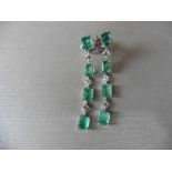 3ct emerald and diamond drop earrings. Each set with 4 emerald cut emeralds and 3 brilliant cut