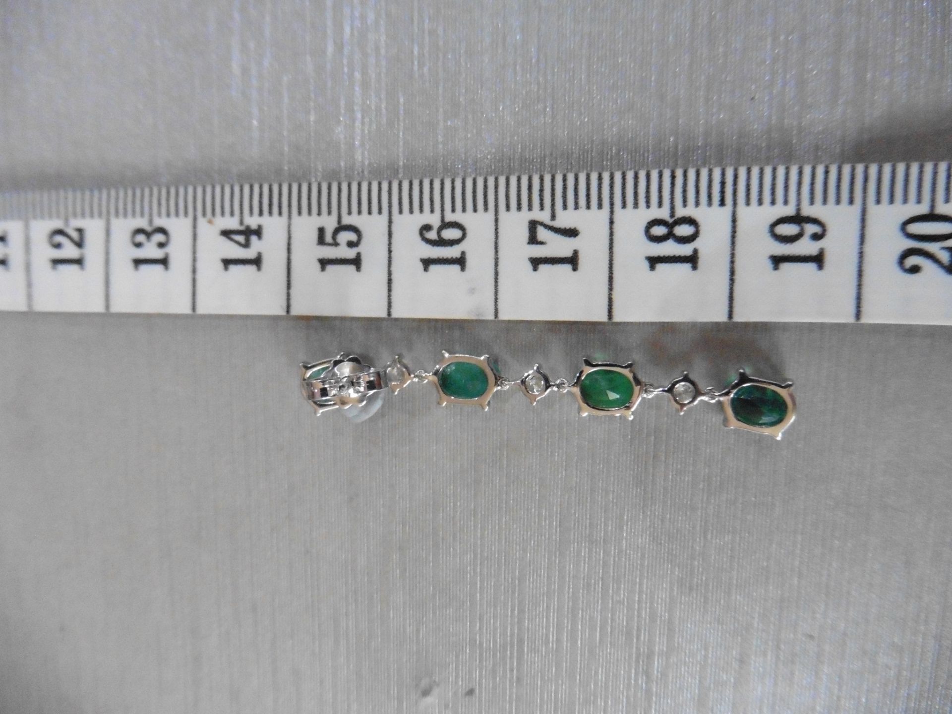 3ct emerald and diamond drop earrings. Each set with 4 oval cut emeralds and 3 brilliant cut - Image 5 of 5