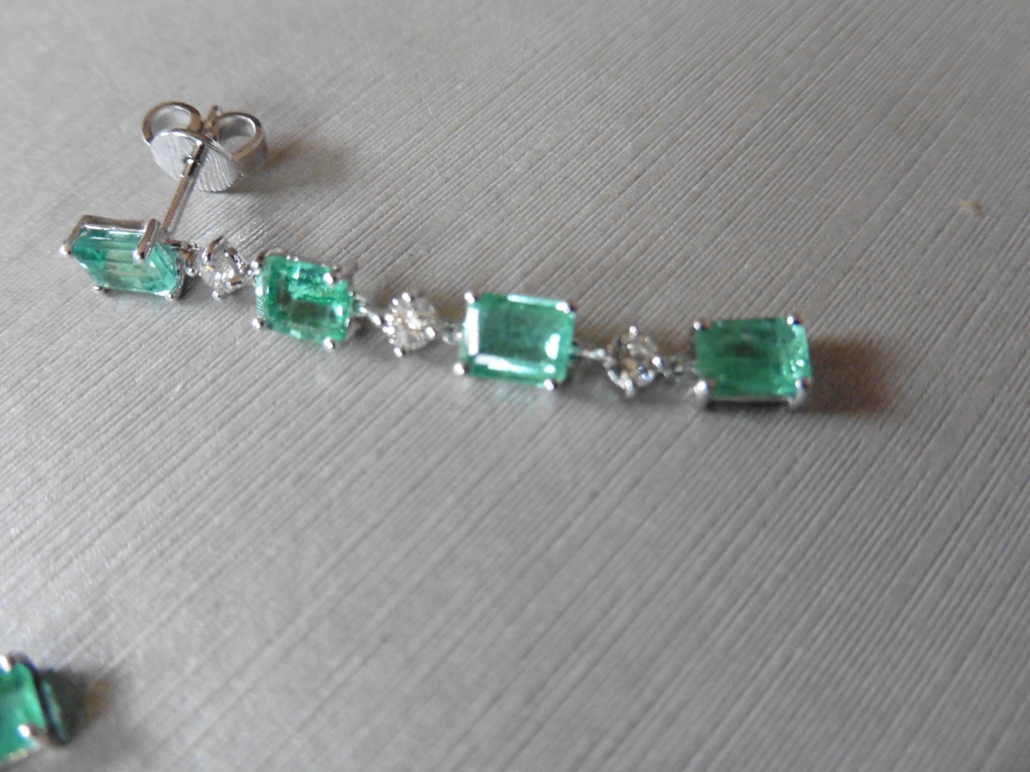 3ct emerald and diamond drop earrings. Each set with 4 emerald cut emeralds and 3 brilliant cut - Image 3 of 5