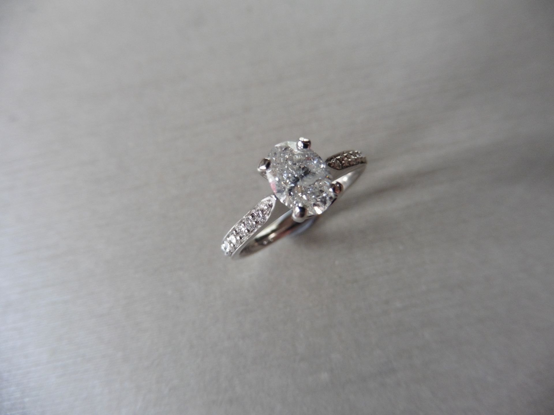 0.82ct oval diamond set solitaire ring. Centre diamond G/H colour, Si3 clarity. Shoulders micro