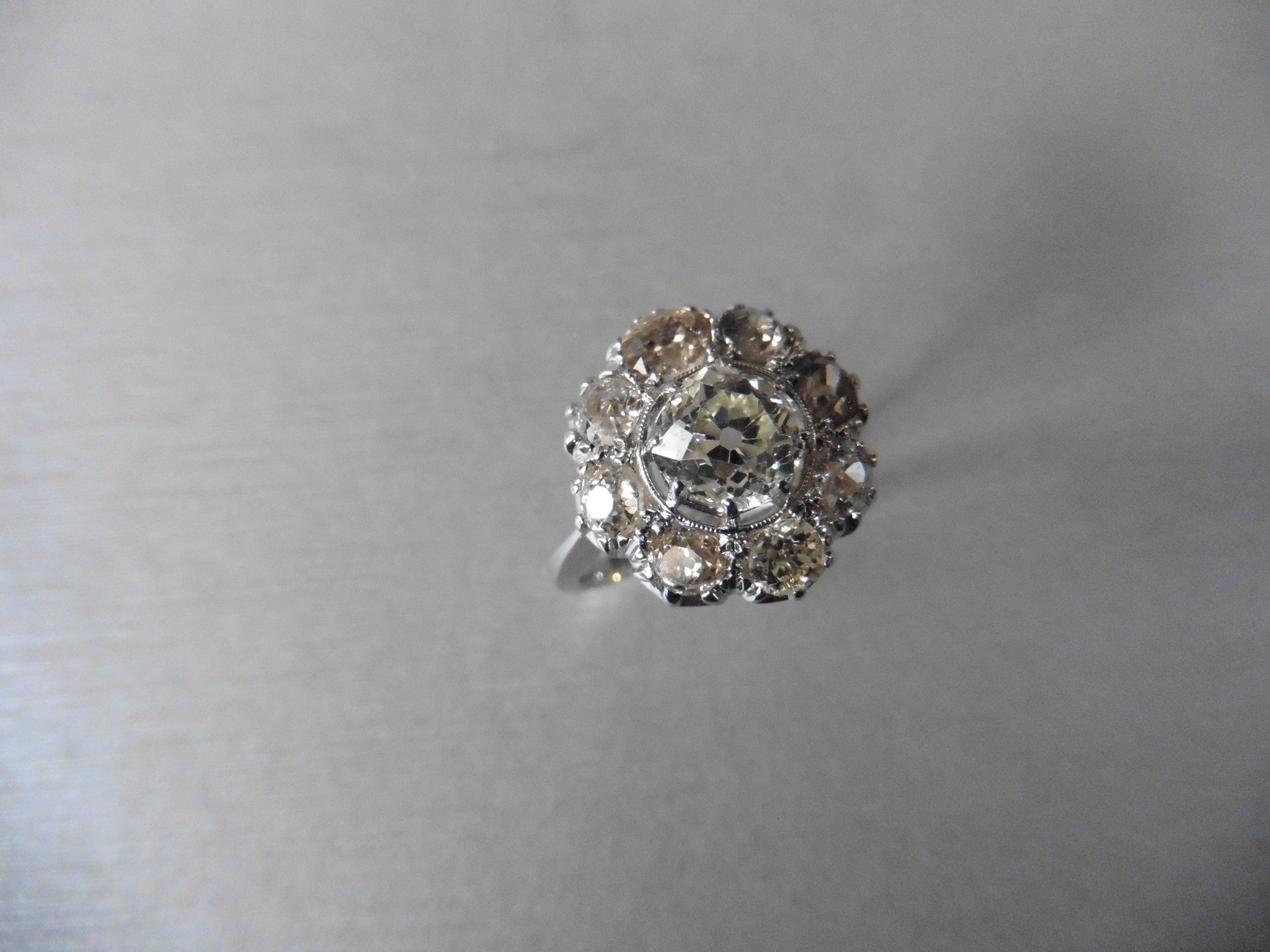 5.20ct diamond flower cluster dress ring. Old cut diamonds, G-I colour and Si-VS clarity. Total