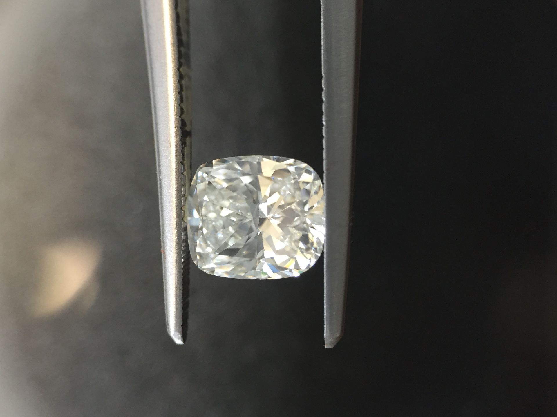 1.03ct cushion cut diamond. J colour, SI1 clarity. 6.25 x 5.56 x 3.71mm. GIA certification _