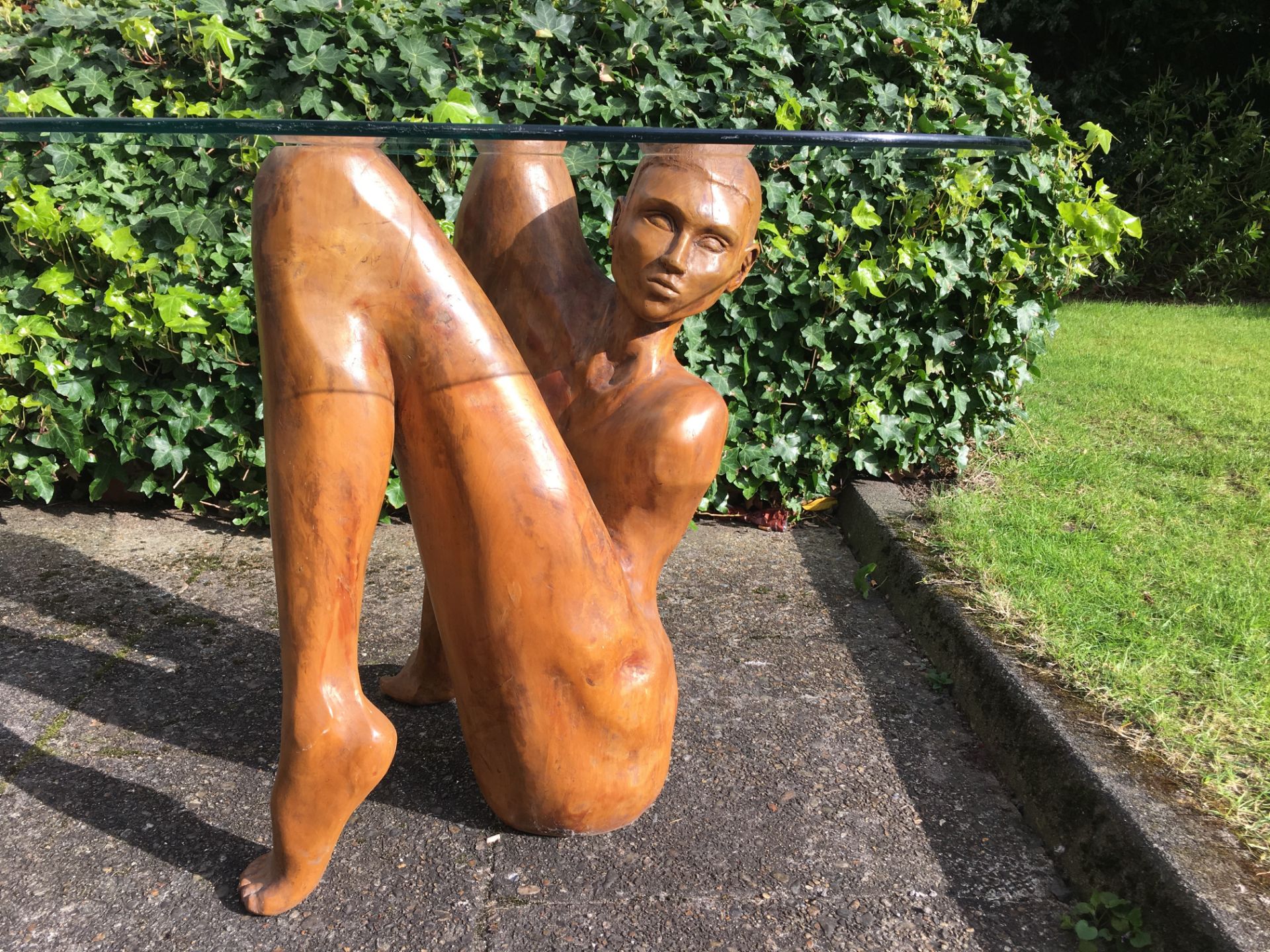 Carved Wood figurative sculptural table, 76 x 54 cms, with rounded triangular glass top - Image 3 of 12
