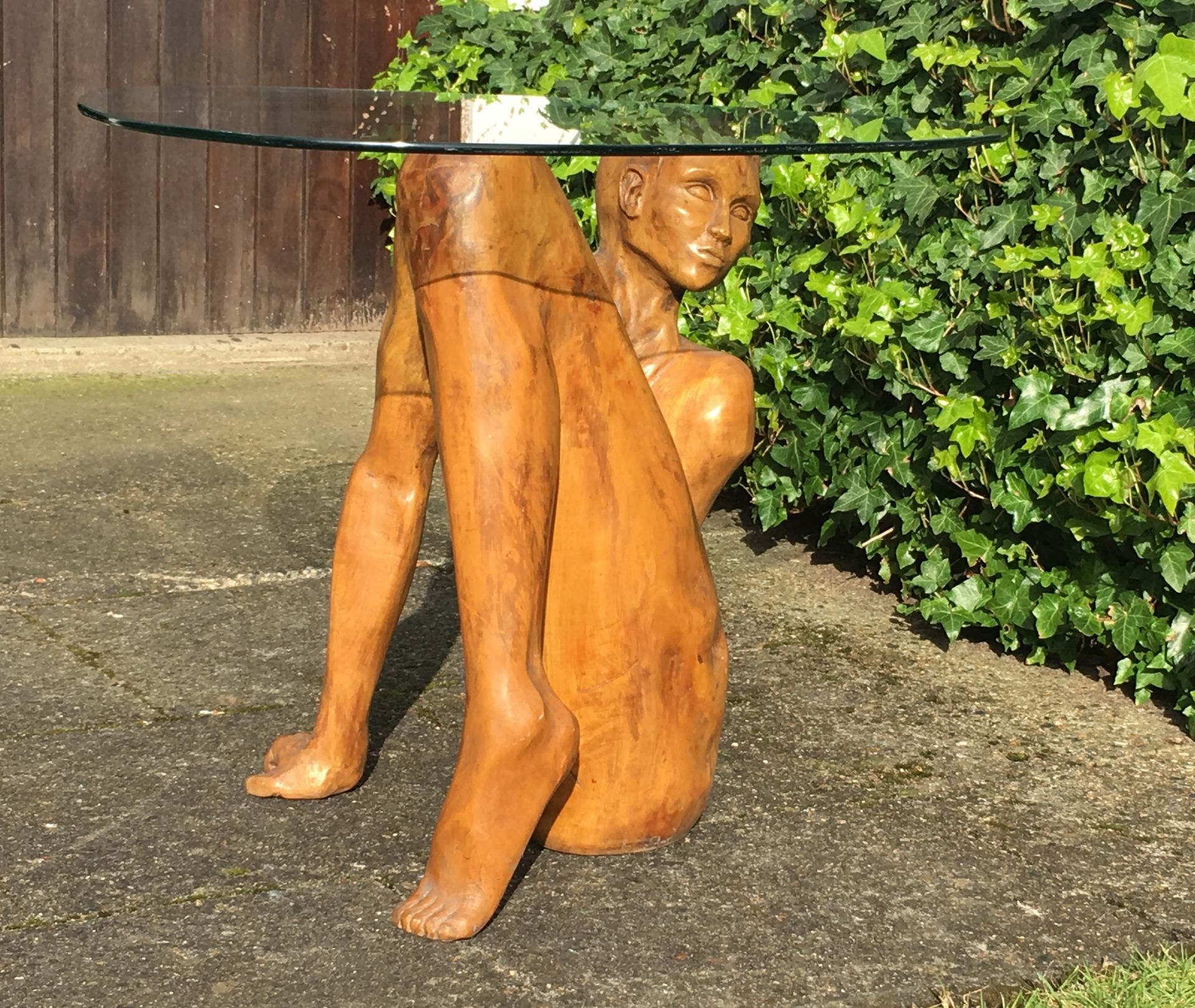 Carved Wood figurative sculptural table, 76 x 54 cms, with rounded triangular glass top - Image 2 of 12