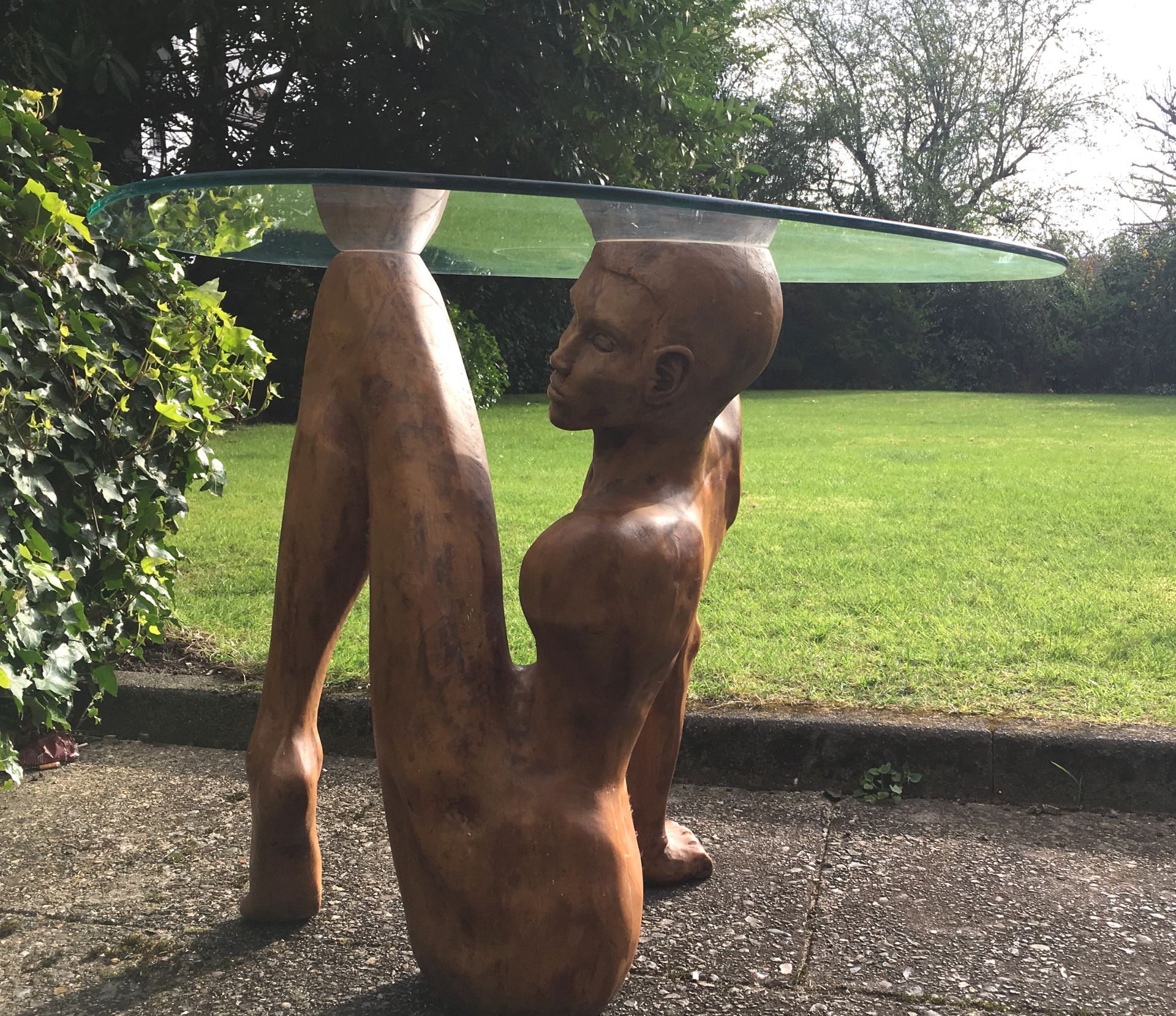 Carved Wood figurative sculptural table, 76 x 54 cms, with rounded triangular glass top - Image 4 of 12