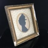 19th Century silhouette profile miniature portrait depicting a lady by Harry Edwin. With an original