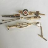 A good group of vintage tie clips to include a Lambourne's equestrian clip. Includes free UK
