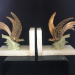 PAIR OF ANTIQUE ART NOUVEAU BOOK ENDS. Onyx base with gold coloured birds amongst foliage.