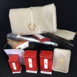 Bulgari Emirates toiletry bag and contents to include Perfume, Hand Cream, Face Emulsion. All