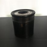 ANTIQUE EBONY AND STERLING SILVER HAT PIN HOLDER. Lidded ebony pot stamped on the base with engraved