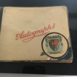 AUTOGRAPH BOOK DATED 1921. Contains some verse and poems together with illustrations. Includes