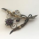 Large vintage brooch set with purple stones. Measures 10cm across. Includes free UK delivery.