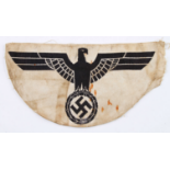 A GERMAN ARMY SPORTS VEST EMBLEM SHOWING EAGLE AND SWASTIKA.