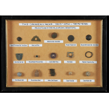 A small framed and glazed display case containing relics from the Crimean War