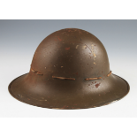 A WW2 Special Fire Patrol SFP green finish helmet