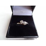 9CT Gold Ring Comprising Two Round Cut Diamond sin a White Gold Illusion Setting