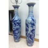 2 x Large Oriental Blue & White Vases Stand at least 10 feet tall. Fish motif