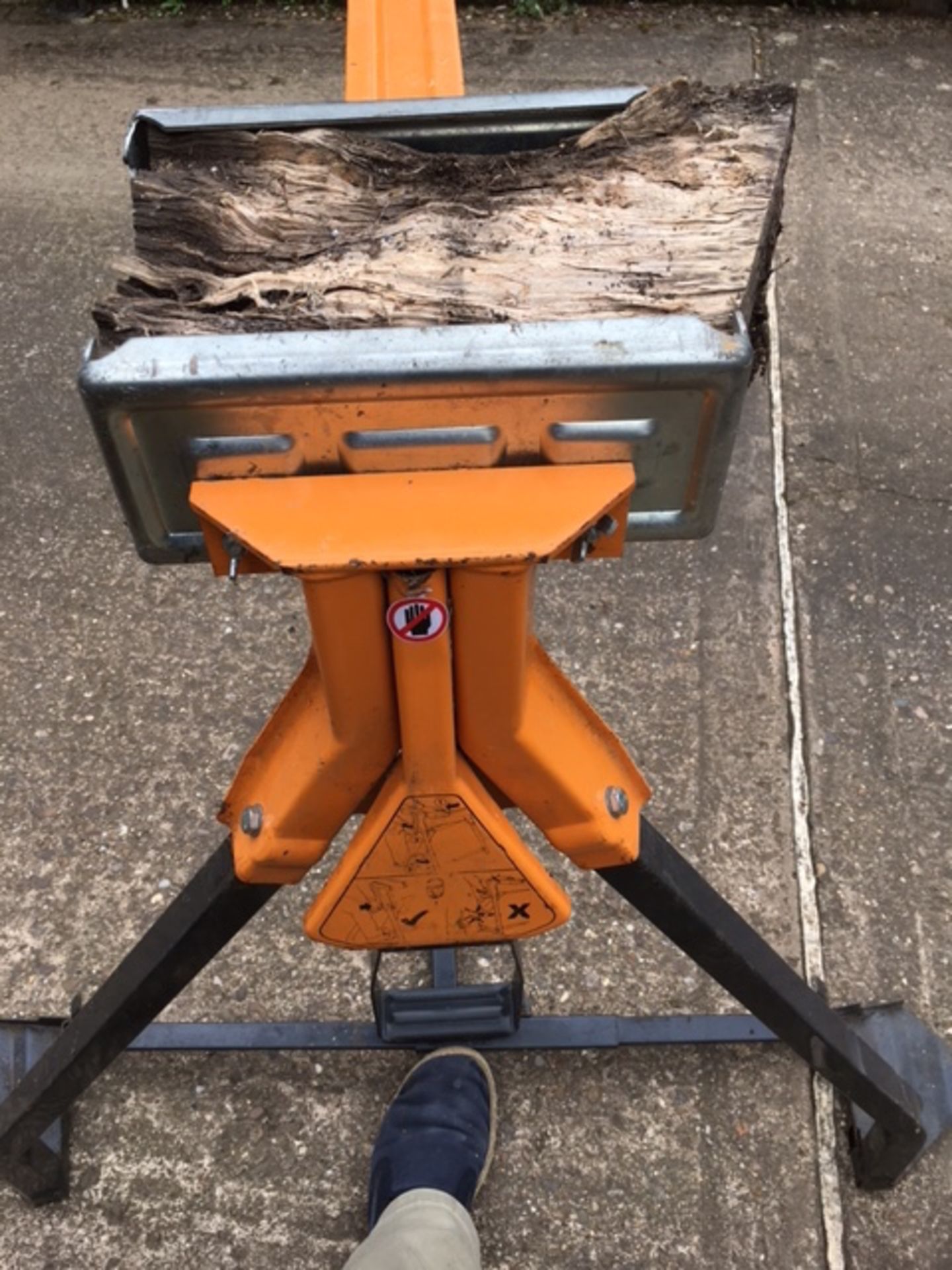Folding Log stand with clamp jaws, Heavy duty, Tripod support legs. Folds down for storage, holds