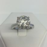 Brand New 5.45 carat uncertified diamond in an 18ct white gold four claw cross over setting