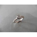 0.41ct 18ct white gold diamond set solitaire ring with a Brilliant cut diamond secured in a rub over