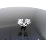 2ct diamond solitaire earrings. Each with a 1ct brilliant cut diamond, G/H colour, I1 clarity. Set