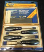 A 4 Piece Chisel Set with Oilstone