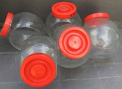4 Red Top Glass Storage Jars