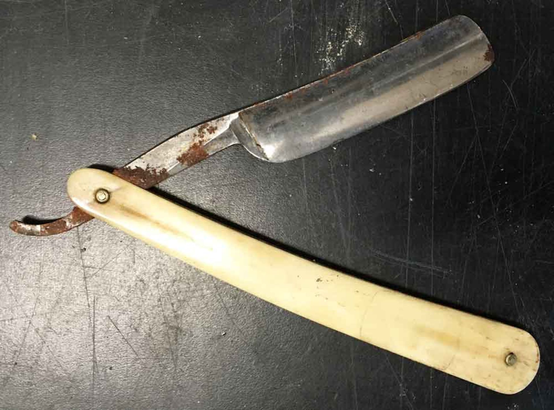 A Vintage Bone Handled Cut-Throat Razor