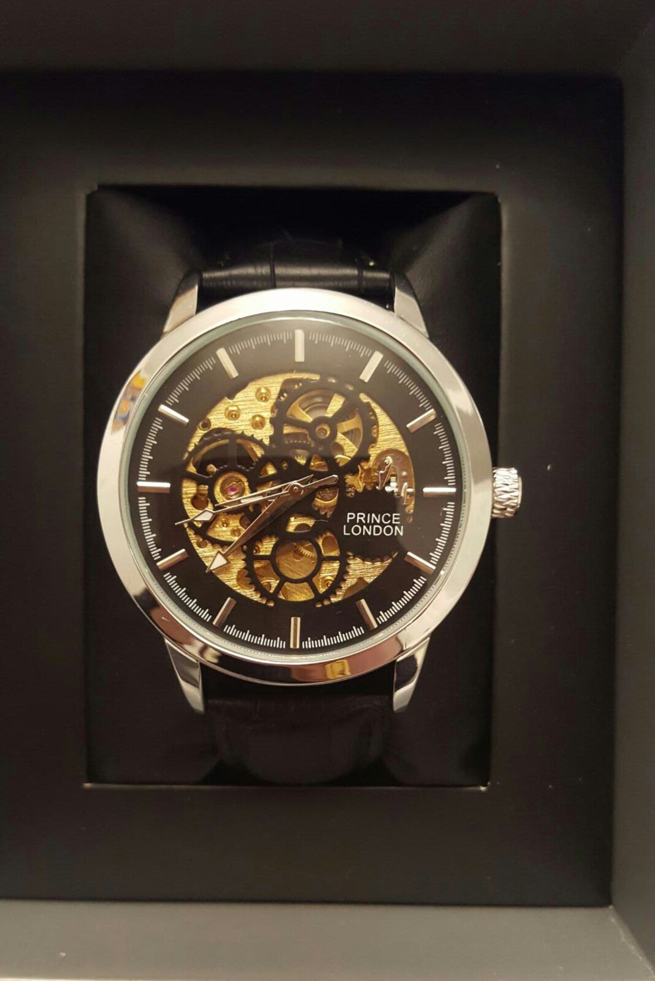 BRAND NEW PRINCE LONDON GENTS AUTOMATIC SKELETON WATCH, SILVER WITH BLACK FACE AND BLACK LEATHER