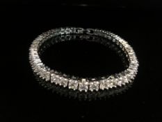 7CT BRILLIANT CUT SIMULATED SAPPHIRE RHODIUM PLATED TENNIS BRACELET