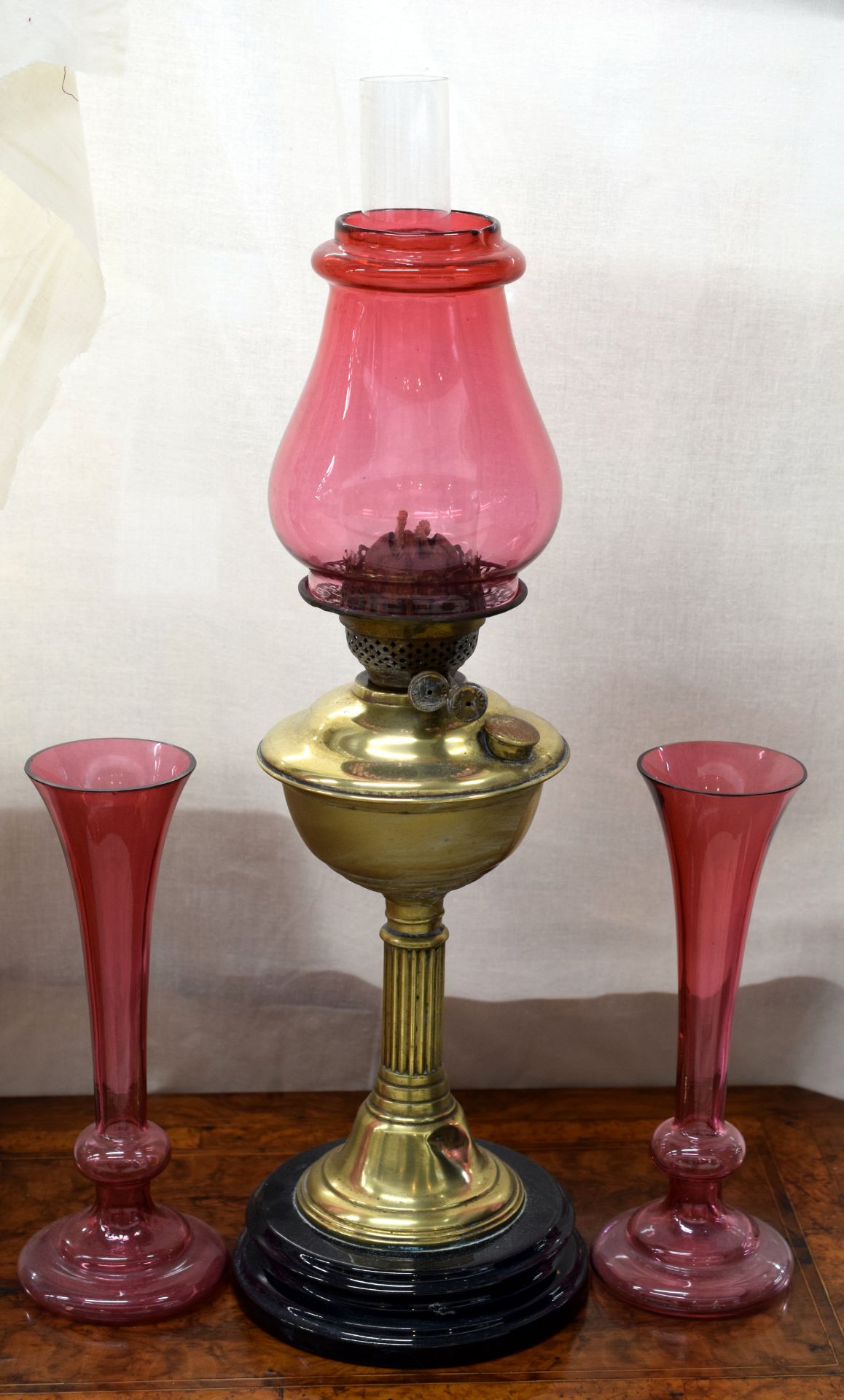 Victorian Cranberry Glass Oil Lamp With Two Cranberry Vases