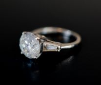 Modern Diamond Three Stone Ring (3.85ct plus 2 x 0.2ct)