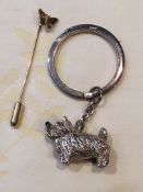Links of London silver hall marked key ring and a 9ct gold butterfly lapel pin.