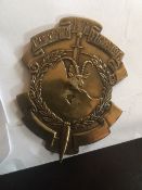 unknown brass military badge,