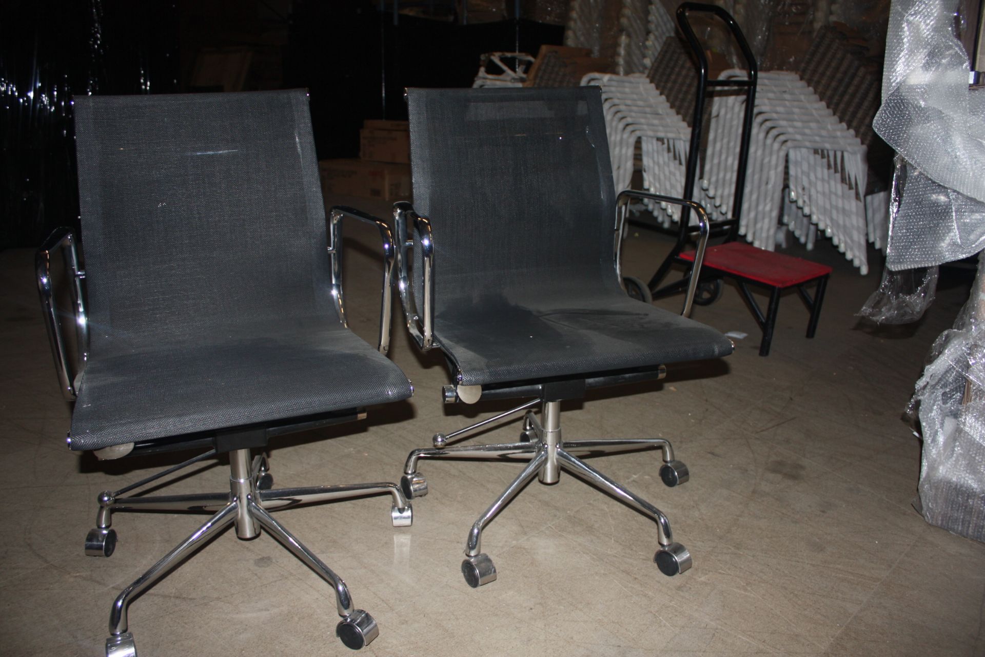 2 x Black office chairs