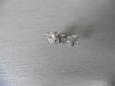 1.40ct Diamond solitaire earrings set with brilliant cut diamonds, I colour I1 clarity.