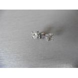 1.40ct Diamond solitaire earrings set with brilliant cut diamonds, I colour I1 clarity.