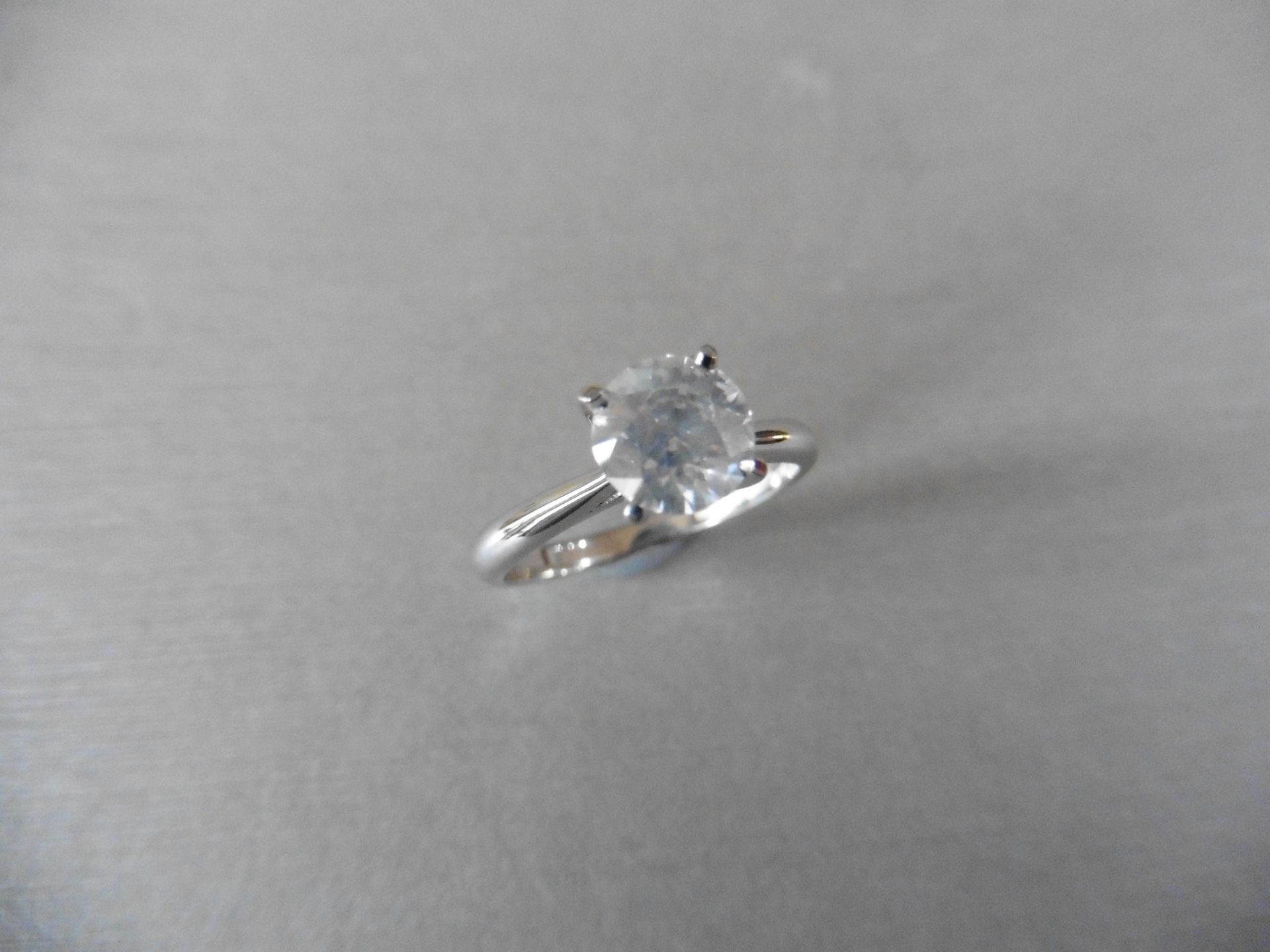 1.50ct diamond solitaire ring set with an enhanced brilliant cut diamond, H colour I2 clarity. 4